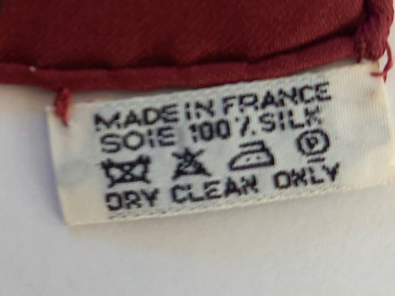 Care label of the Hermès scarf Feux du Ciel